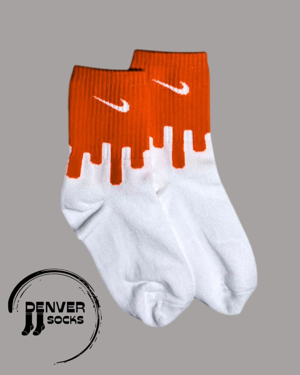 NIKE MANCHA NARANJA - BLANCA